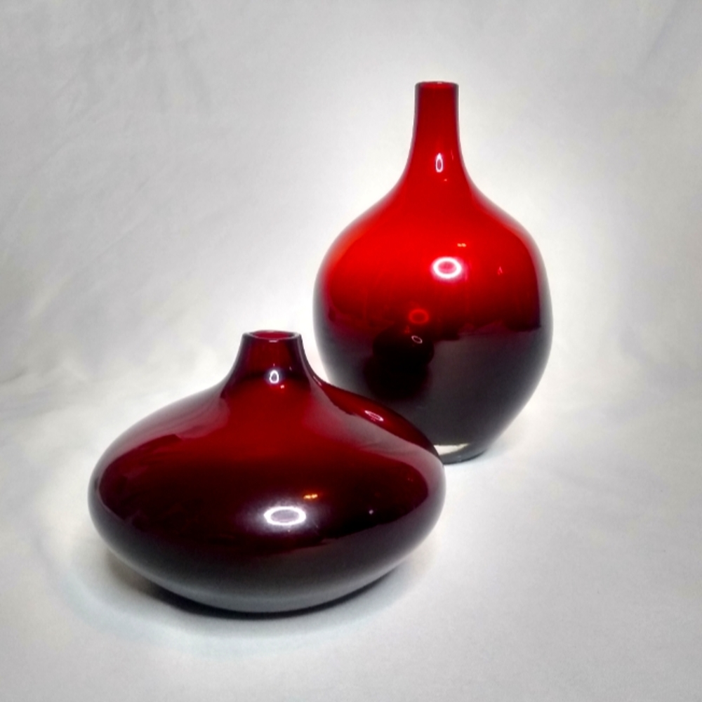 Set of (2) red glass vases